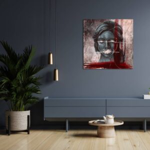 Interior decoration with a contemporary abstract digital painting on the wall, Angelica, by Belgian painter Laëtitia Nemery. Canvas in predominantly red and gray tones. Portrait painting